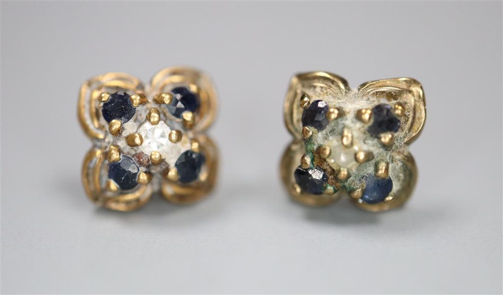 A pair of 9ct gold and gem set earrings, no butterflies, gross 0.9 grams.